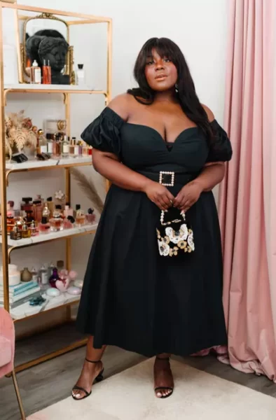 plus-size-wedding-guest-outfit-offshoulder-black-394x600.png